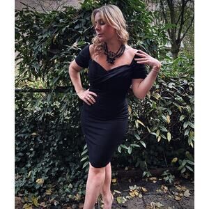 Vintage black dress by Frank Usher with sweetheart neckline, size 10